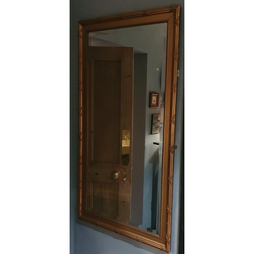 165 - A good early 20th Century rectangular Mirror with reeded outline and bevelled mirror glass. 74 x 134... 