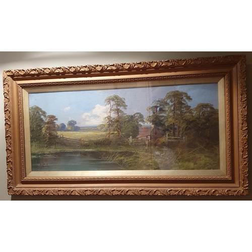 190 - J. Cole. A good pair of Oils on Board of Cottages beside a lake, both signed. 38 x 82 cm approx.