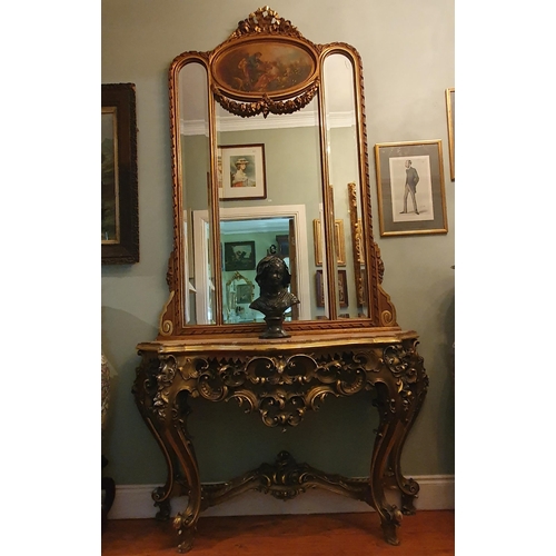 195 - A good early 20th Century Console Table and Timber Gilt Mirror with highly pierced outline, serpenti... 