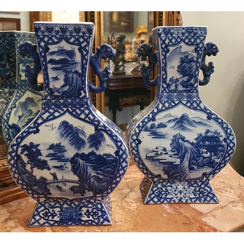 196 - A pair of Oriental Vases with blue ground. W 20 x H 33 cm approx.