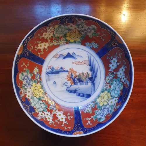 24 - A good Oriental hand painted Bowl with Imari pattern detail. Diam. 22 x H 8.5 cm approx.