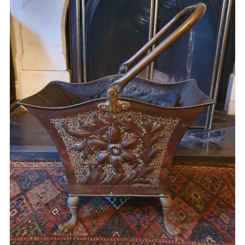 56 - An unusual 19th Century Coal Bucket with embossed panelled sides and brass lifting handle. 47 x 29 x... 