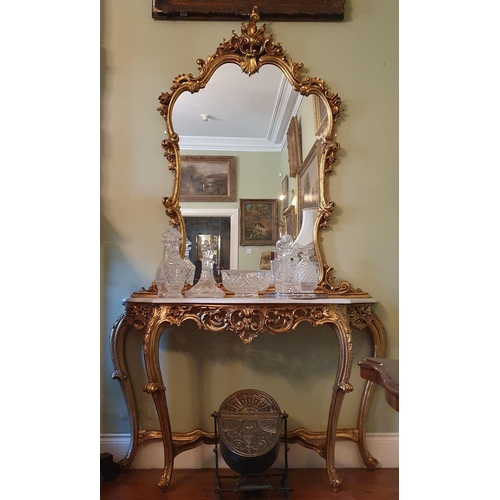 62 - A good 20th Century Timber and Plaster Gilt Console Table and Mirror with carved pierced outline and... 