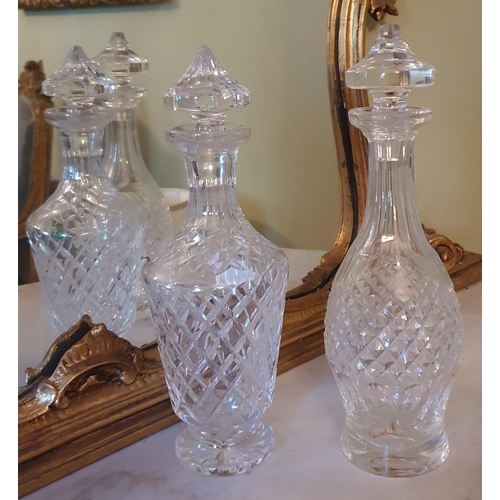 64 - Two Waterford Crystal Decanters.