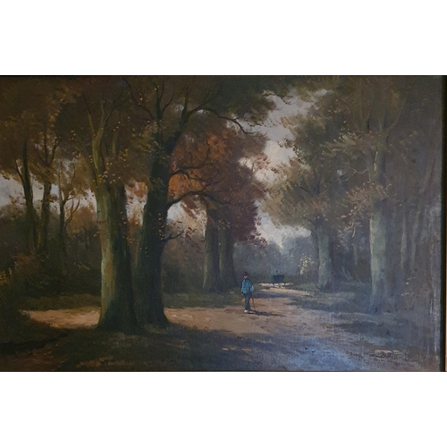 69 - A 19th Century Oil on Canvas of a Man walking down a wooded path. In a good gilt frame. No apparent ... 