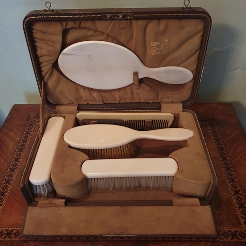 80 - A 19th Century bone handled Vanity Set by Prestons of London. In original leather embossed case.