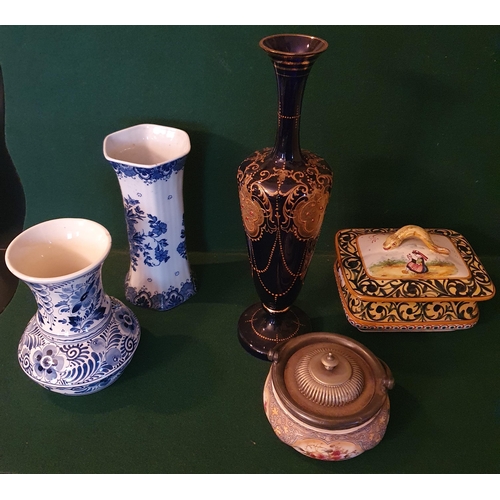 84 - A good group of Items to include a hand painted blue glass bud vase, a Doulton ware pot, two blue gr... 