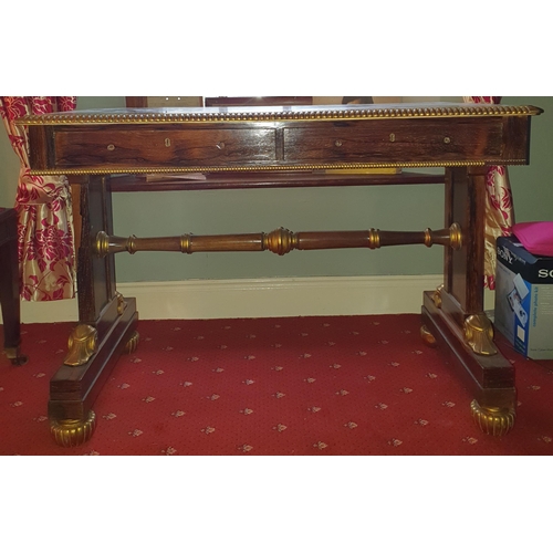 216 - A fabulous 19th Century Rosewood and Gilded Writing Table with twin frieze drawers and parcel gilt o... 