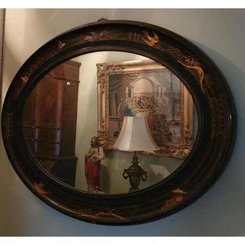 241 - A good early 20th Century chinoiserie painted oval Mirror. 93 x 68 cm approx.