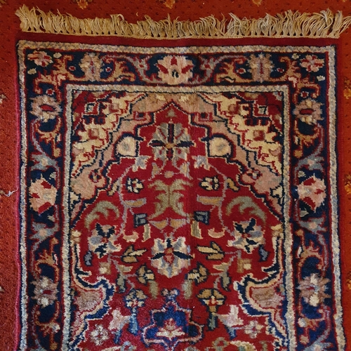 242 - A good Persian red ground Runner with multi borders and central medallion design.
180 x 56 cm approx... 