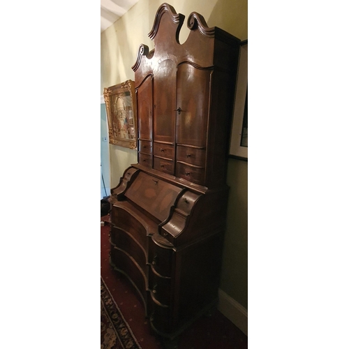 248 - A fantastic 19th Century Walnut Continental Bureau with arch top pediment and inlaid panel doors. 10... 