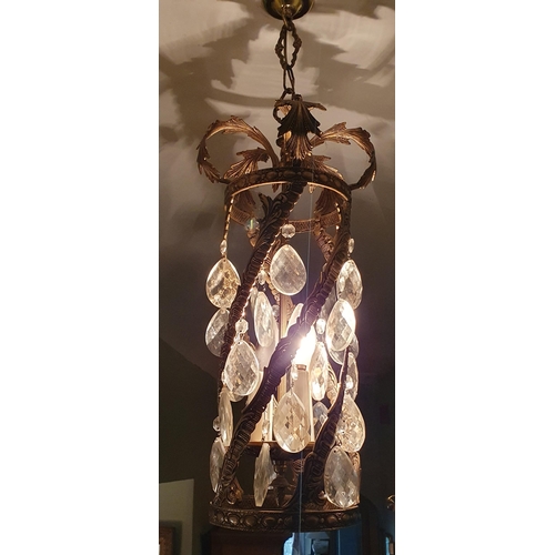 249 - A good pair of Brass and Crystal hanging Lanterns. Purchased by the vendor in New York many years ag... 