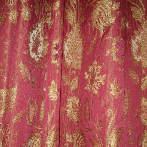 271 - A good pair of burgundy ground lined Curtains with tiebacks and silver rail. Drop 230 x 90 cm approx... 