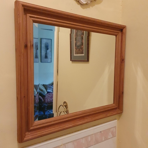 281 - A quantity of Indian Pictures along with a pine mirror and other items in the bathroom.