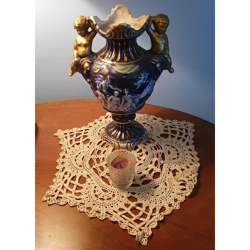 307 - A large Alabaster lidded Pot along with a 19th Century pottery vase with cherub lifting handles H 30... 