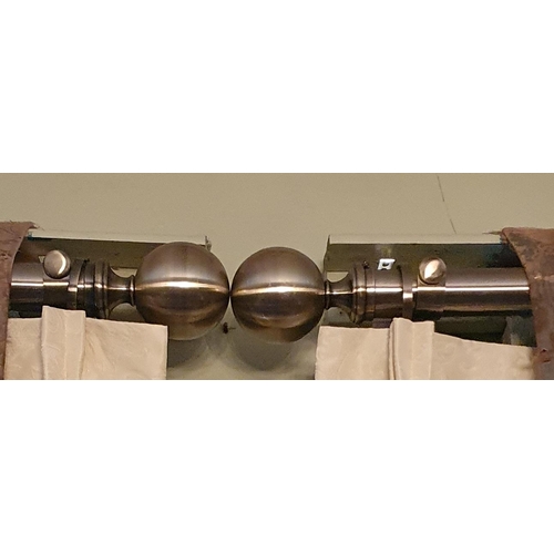 106 - A pair of Silver Metal curtain Poles 260cm approx.