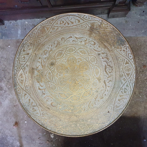 835 - An early 20th Century Brass circular Table with highly etched top 50diam x 62h cm approx.