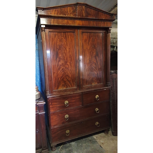 838 - A fantastic Regency Mahogany Linen Press with two short over two long with original ormolu ring hand... 