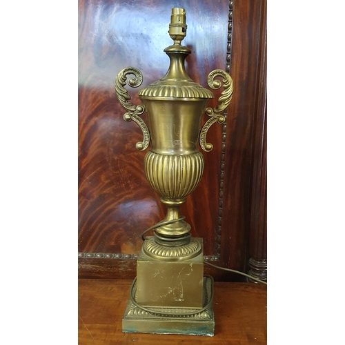 840 - A good Brass urn shaped Table Lamp. H 55 cm approx along with four Goblets.