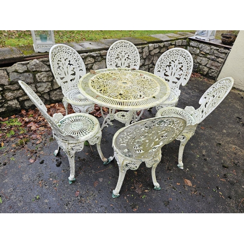 1000 - A good pierced Metal Patio Set consisting of a table with pierced outline and six chairs.
80 x 67 cm... 