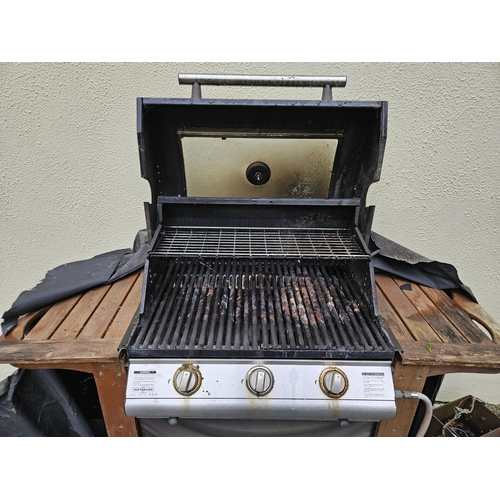 1001 - 'The Australian'. A large Gas fired Barbecue along with a full gas cannister.