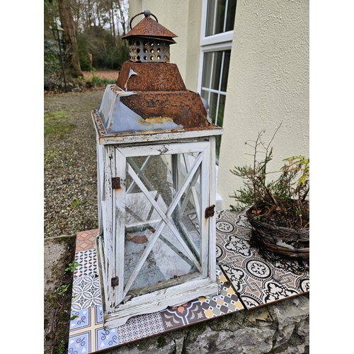 1002 - Two pairs of Timber Lanterns.