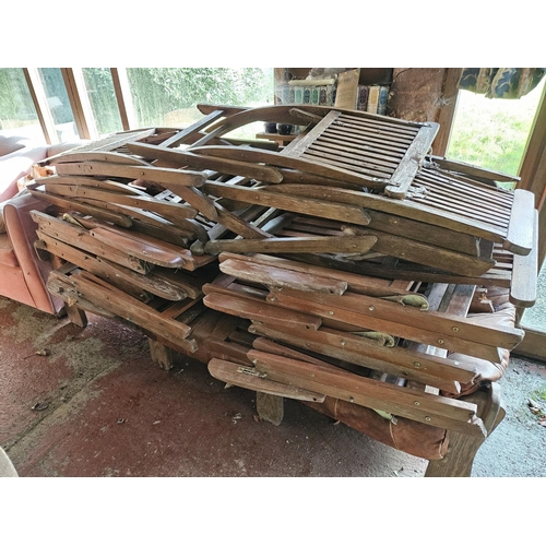 1050 - A good quantity of foldup Timber garden Seats.