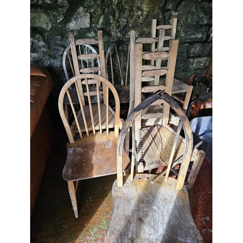 1054 - A quantity of Oak Timber Chairs with rush seats.