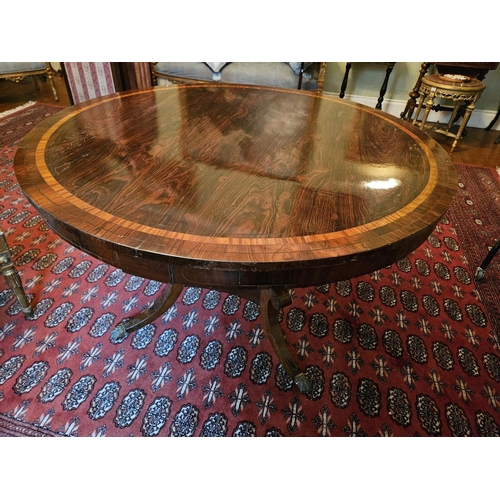 109 - A good Regency Rosewood Veneered and Crossbanded circular Centre Table on a platform quatrefoil base... 