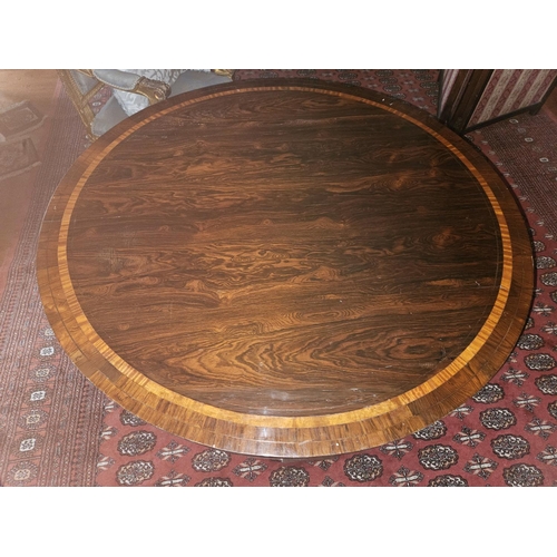 109 - A good Regency Rosewood Veneered and Crossbanded circular Centre Table on a platform quatrefoil base... 