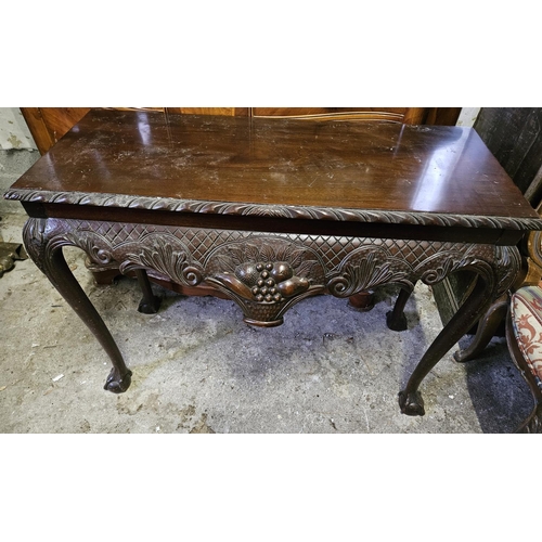 822 - A 20th Century Mahogany Side Table with highly carved frieze and carved cabriole supports. 106 x 43 ... 