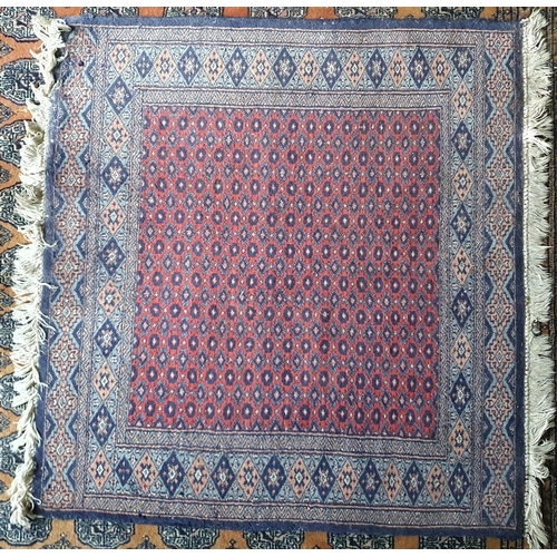 342 - A blue ground Persian Rug with multi borders and repeating medallion design. 180 x 120  cm approx.