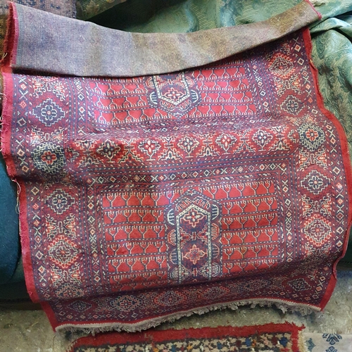 807 - A good quantity of Rugs along with a piece of fabric.