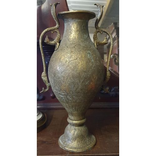 825 - A large highly etched Brass Urn with serpent lifting handles along with a good quantity of 19th Cent... 