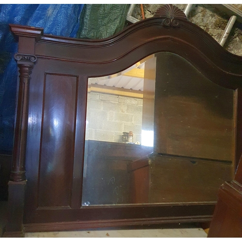 842 - An Edwardian Mahogany Overmantel Mirror with highly moulded outline. 141 x 100 cm approx.