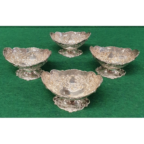 945 - A lovely set of four London Silver Salts marks rubbed, 267 gms approx