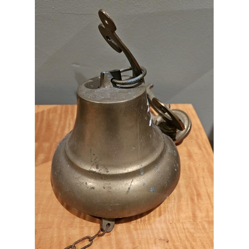 974 - A wall mounted Brass Bell, 16cm diam approx.