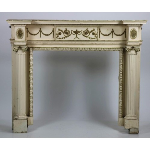 847 - An attractive painted and parcel gilt wooden Fireplace, in the Neo-Classical style of inverted break... 