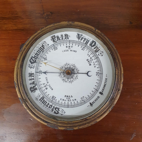 144 - A good aneroid wall mounted Barometer. D 20 cm approx.