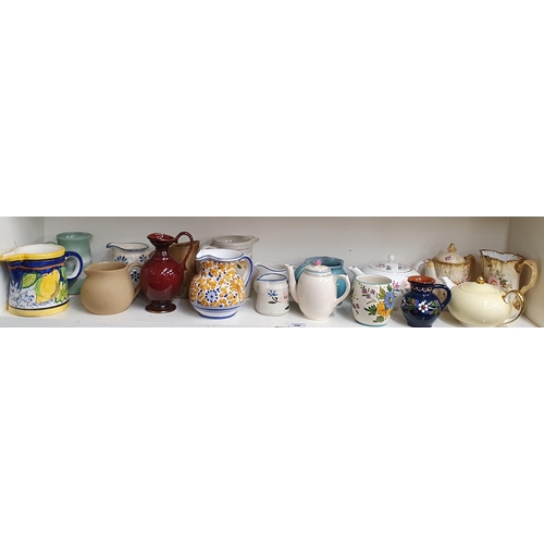 186 - A good quantity of 19th Century and later Jugs and Teapots.