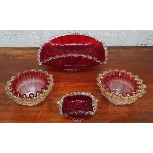 264 - A pair of Cranberry Glass Bon Bon Dishes along with a cranberry glass centrepiece and a small dish.