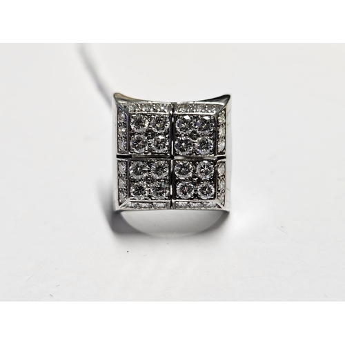 334 - A large Diamond cluster Ring set in Silver, size K.