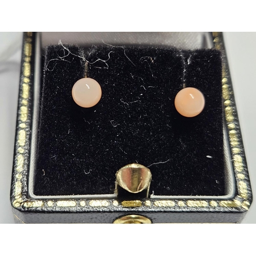 327 - A pair of Gold and Coral set Earrings.