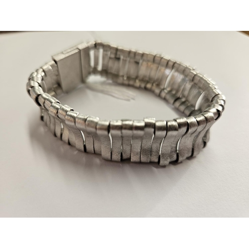 366 - A very heavy Silver Bracelet.