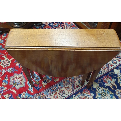 380 - A late 19th early 20th Century miniature dropleaf Table on square tapered supports. 54 x 68.5 x H 50... 