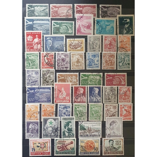 422 - A large collection of Yugoslavia and Albania Stamps.