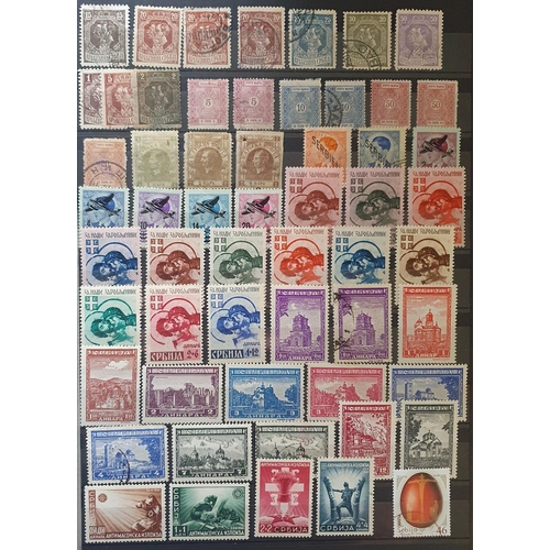 422 - A large collection of Yugoslavia and Albania Stamps.