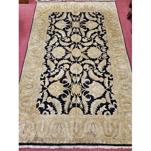 436 - A cream ground Carpet with multi borders. 292 x 188 cm approx.