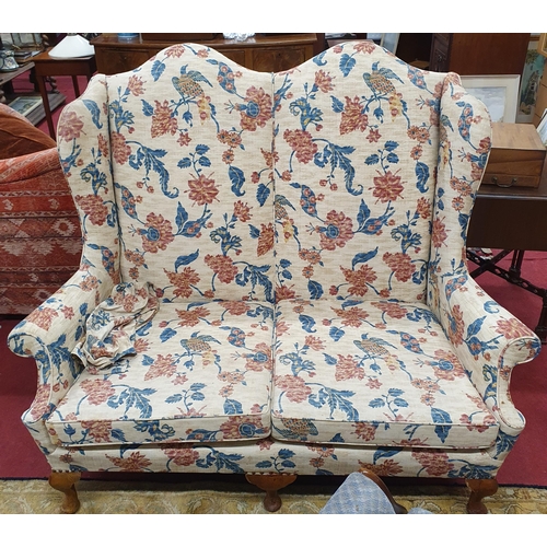 433 - A good high wingback two seater Armchair on cabriole supports. W 148 x BH 122 cm approx.