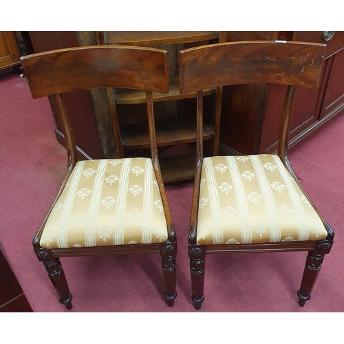 607 - A pair of 19th Century Dining Chairs on turned hexagonal front supports with gold stripe upholstery.